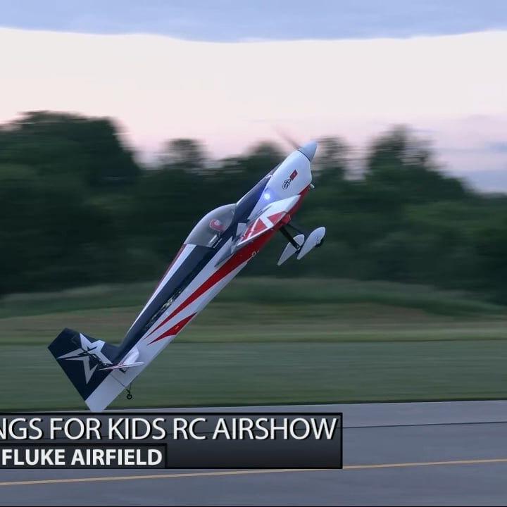 Keith Kaiser watches an aircraft fly through the sky